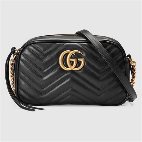 black gucci bag small.